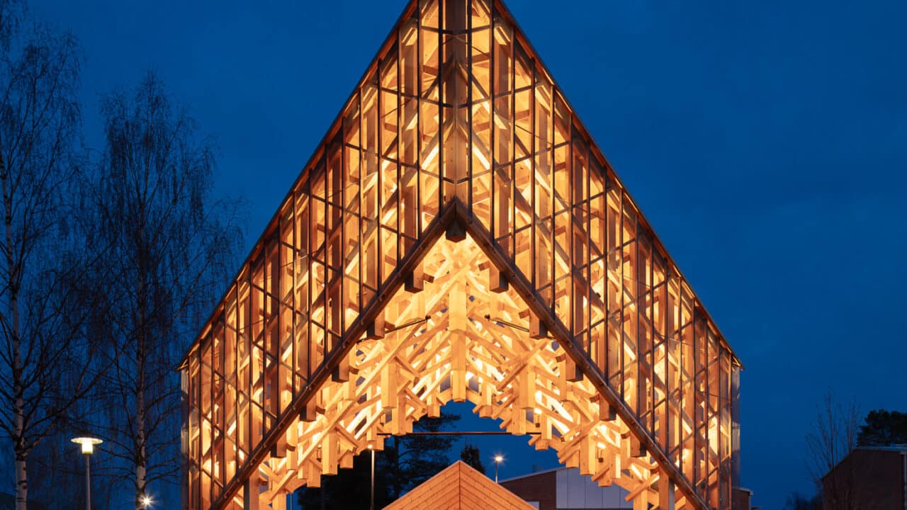 The Kide stage, photographed on a summer night. The structure is illuminated. Photographer: Mikko Auerniitty.